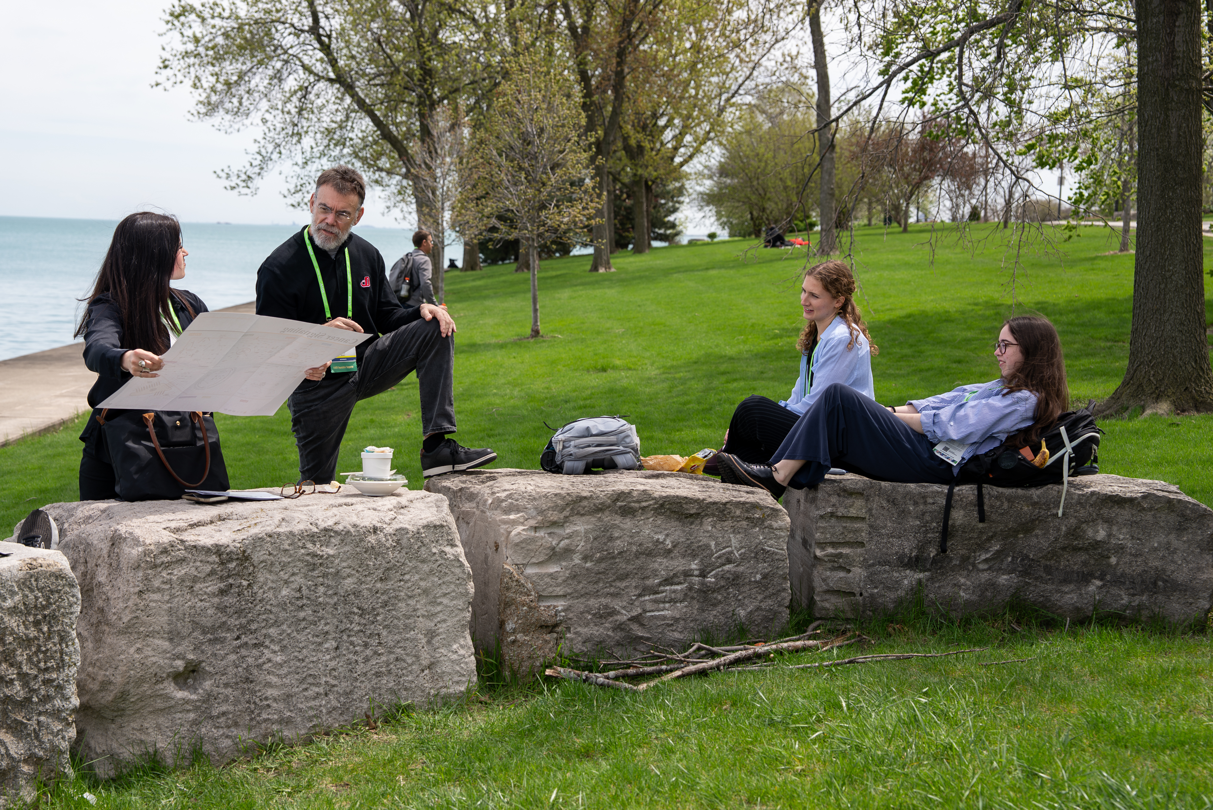 Prof Roberts and students at a research conference