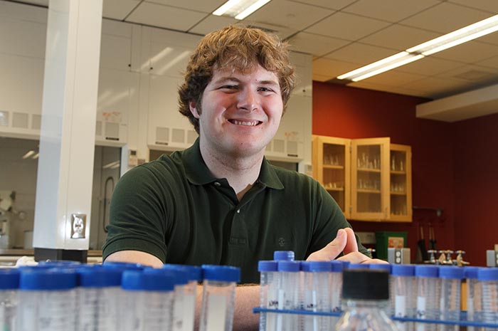 Aaron Brumbaugh '14 in the lab