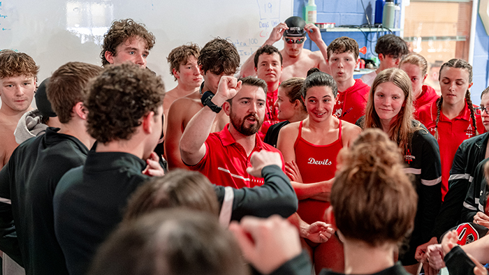 Dickinson's 2026 men's and women's swim teams and their coach. Photo credit: Cain McMillan Photography.