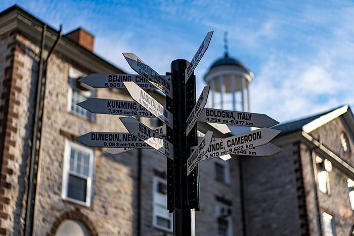 Dickinson's global sign post stands in front of Old West.