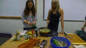 French Club members preparing Thanksgiving dinner.