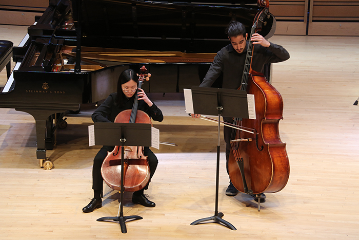 Chamber music students performing strings