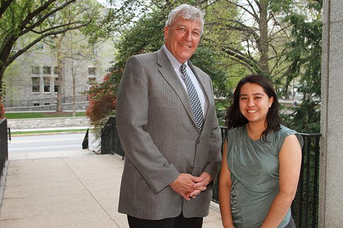 Jim Chambers '78 poses with the recipient of his scholarship, Yessenia Tostado '16. 