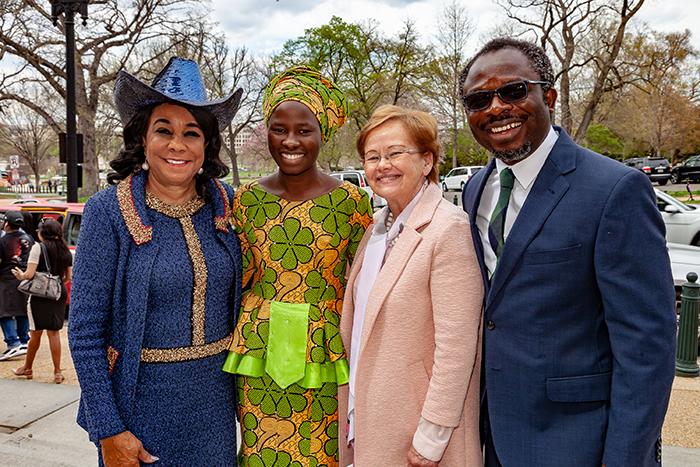 Portrait of Congresswoman Frederica Wilson, Dickinson Bridge Program student Patience Bulus, Dickinson College President Margee Ensign, Dickinson College Visiting Scholar Jacob Udo-Udo Jacob