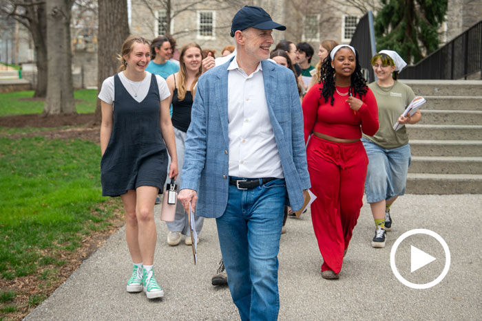 Chriss Sharples walks with students
