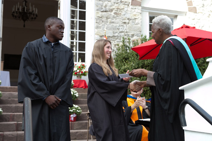 Joyce Bylander, vice president and dean of student life, presents the Shuman Prizes to Valerie Brielle Busch &#039;20 and Kevin Ssonko &#039;20.