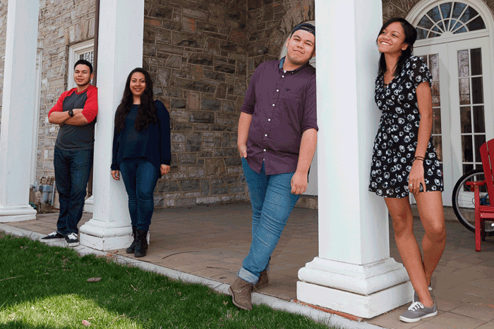 Edgar Estrada ’18, Janel Pineda ’18, Armando Moreno ’20 and Jennifer Zapata ’17 in front of the Social Justice House.