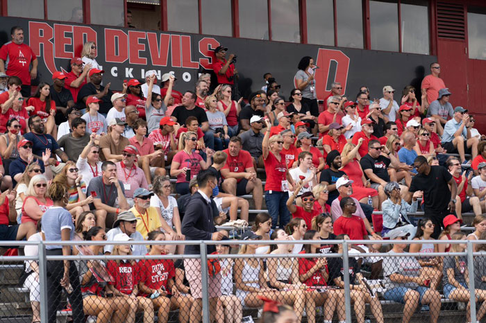 A crowd cheers at Biddle Field