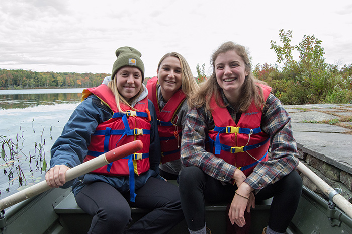 3 students in a boat