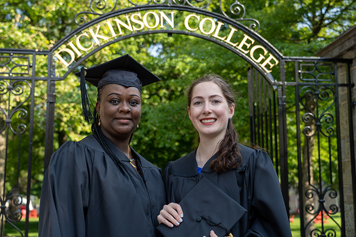 “The more I learned, the more I wanted to learn," says Annwen Hughes White '19, M.A. '23 (right), pictured here with Adjila Boubacar M.A. ’23. Photo by Dan Loh.