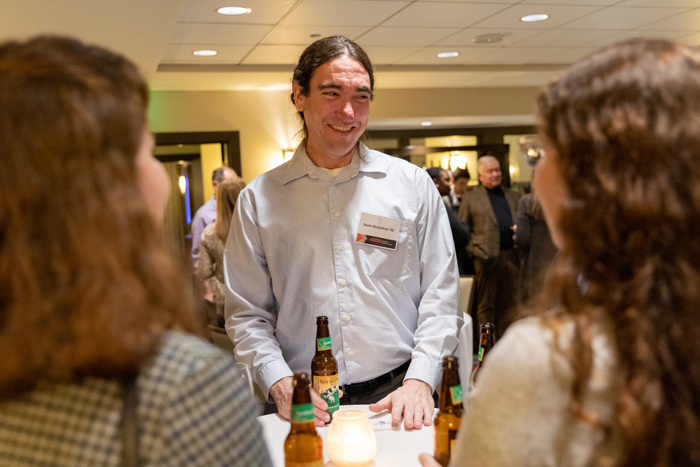 Brett McGeehan ’05, one of several Dickinson graduates working at Epic, connects with other local Wisconsin alumni during the Dickinson Forward Tour event.