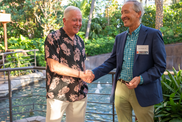 Mark Burgess '81 (right) introduces President John E. Jones III ’77, P’11, before he addresses the guests at the Miami Dickinson Forward Tour stop.
