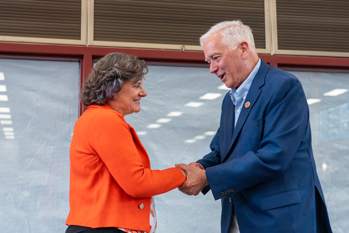 President John E. Jones III '77, P'11, congratulates Academic Department Coordinator Stacy Rohrer during the inaugural Distinguished Staff Awards ceremony. Photo by Dan Loh.