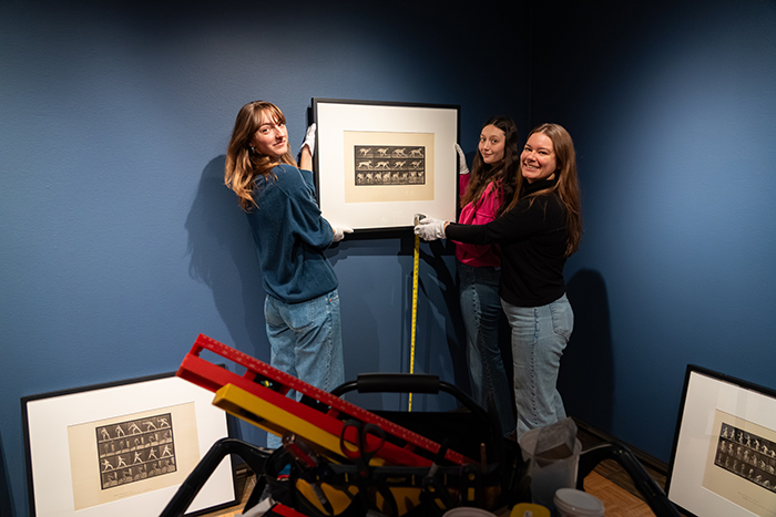 Class of '26 art-history majors Lena Rimmer, Anna Radigan and Abigail Allport researched Muybridge's work and curated the Trout Gallery exhibition. Photo by Dan Loh.
