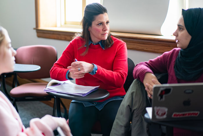 Emily kelahan with students