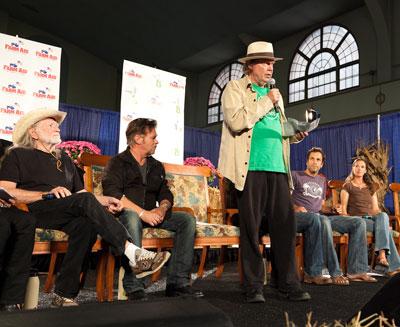 Picture of Farm Aid advocates on stage