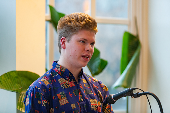 Erik Smith '23 discusses his paper. Photo by Carl Socolow '77.