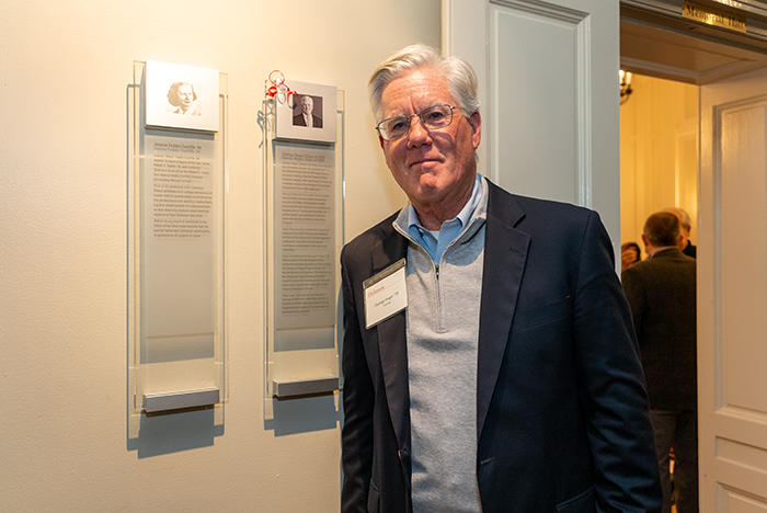 George Hager '78 pauses before the plaque bearing his name. Photo by Dan Loh.