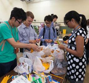 Fulbrighters volunteered at Project S.H.A.R.E. and helped stuff backpacks with school supplies for local children in need.