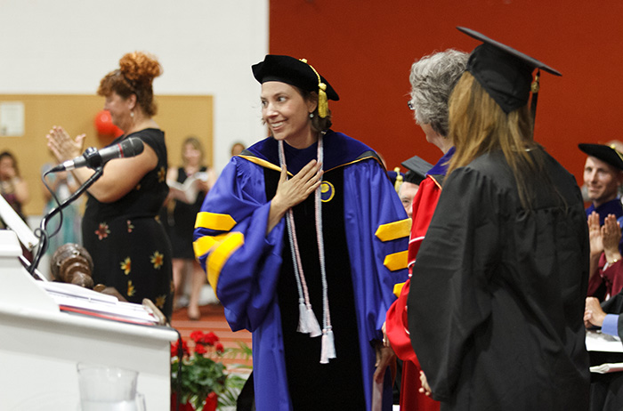 Wlodarski responds with surprise and gratitude during the 2015 Commencement ceremony. Photo by Carl Socolow '77.