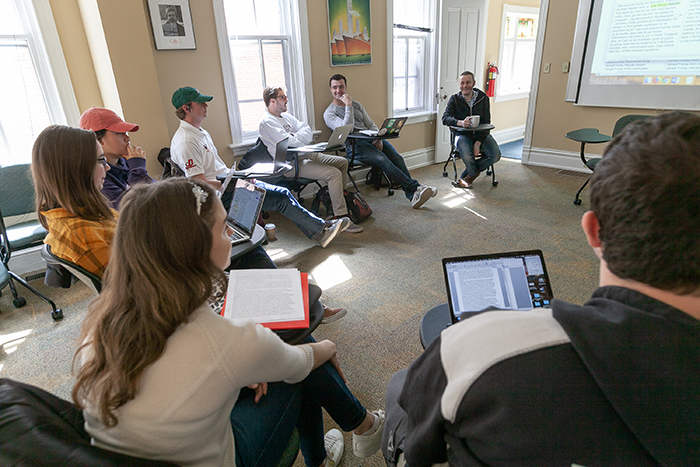 Nine students studying German media work with well-known German writer-performer Ahne during a March 27 class.