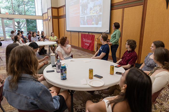 Associate Professor of German Antje Pfannkuchen delivers an introduction during a student presentation of original fieldwork conducted in Germany. Photo by Joe O'Neill.