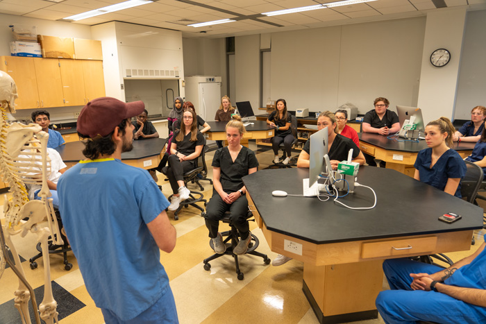 A professor teaches the anatomy class