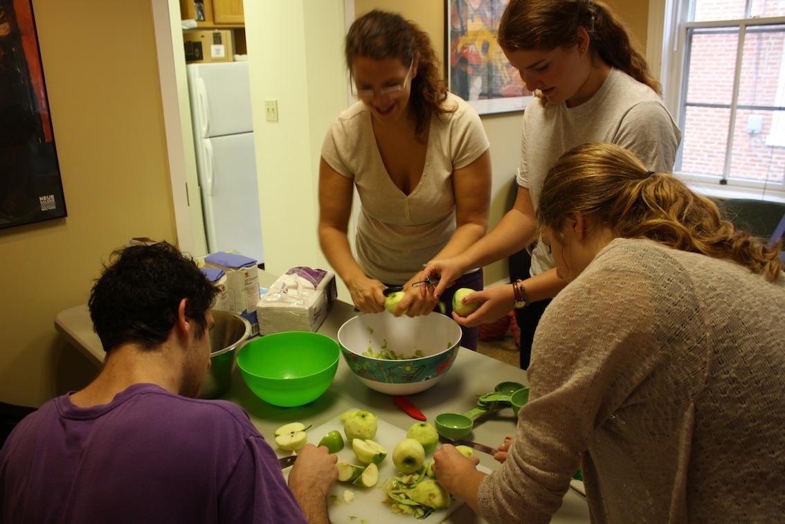 Students peeling apples.