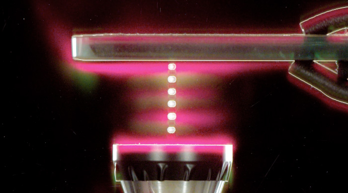 Image from Chang and Jackson’s acoustic levitation experiment. The colors, made visible by high-tech equipment, appeared just as you see them here.