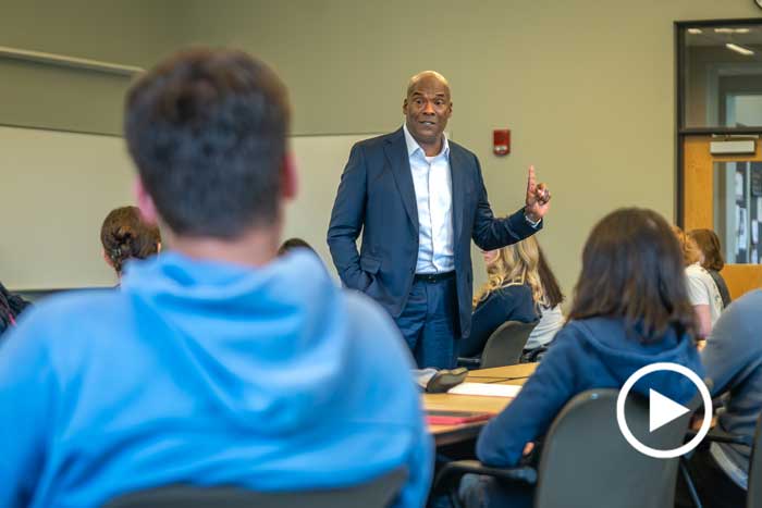 Jimmy Williams talks to students in a classroom
