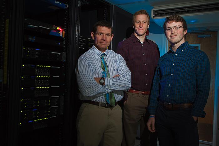 Johnson, Cousins and Millichap pose in the IR Office.