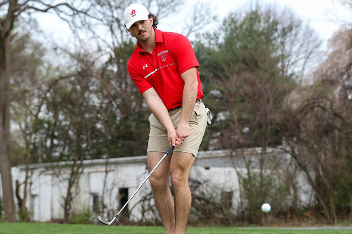 Collin McMahon-Shea hits a golf shot