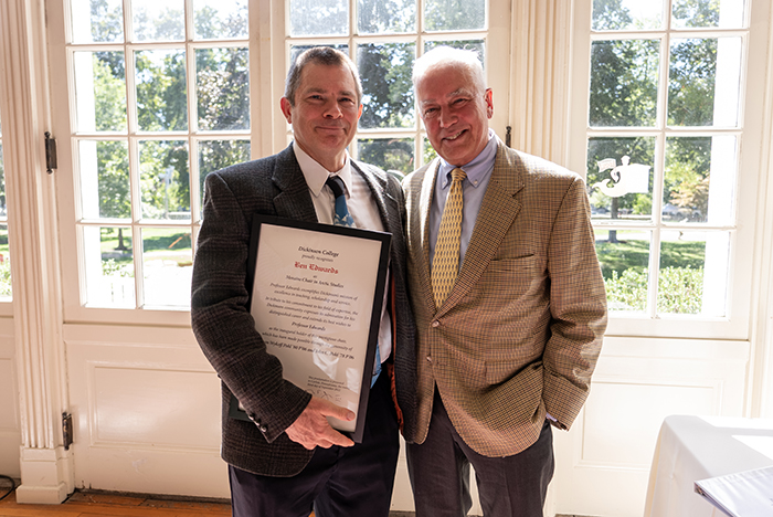 Ben Edwards, professor of earth sciences and Moraine Chair in Arctic Studies (left), poses with President John E. Jones III '77, P'11, after a Sept. 23 ceremony in Edwards' honor. Photo by Dan Loh.