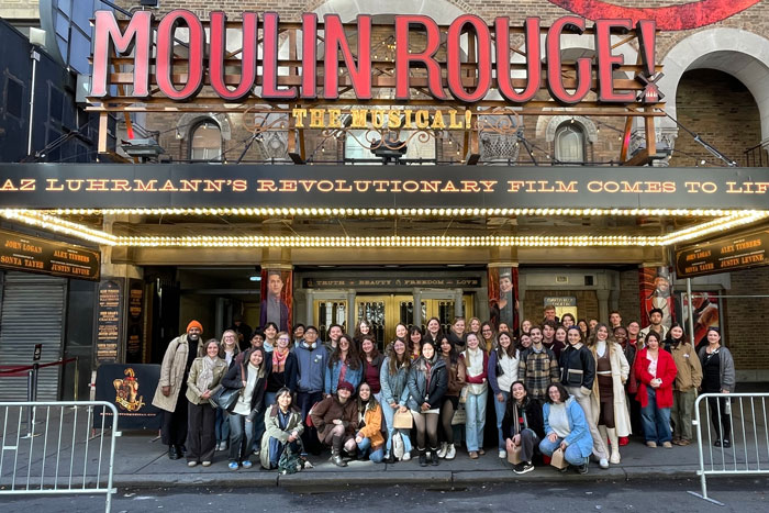 Students in front of a New York City theater