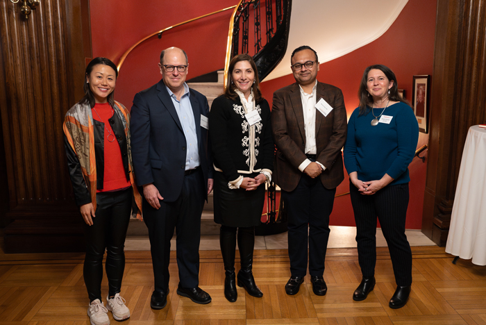 Members of the Dickinson Finance & Business Network planning committee (from left: Laura Chen '11, Holcombe Green '92, Ruth Ferguson '92 and Rohan Sen ’08) pose with Provost & Dean Renée Cramer (right) during the event.  