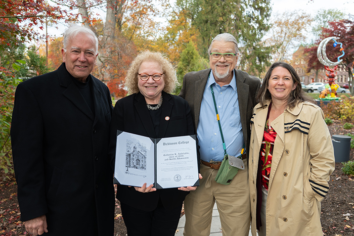 This month Cathy Andriadis '80 and Karlis Adamsons were honored with a paver on the Old West Society Walk. From left: President John E. Jones '77, P'11, Andriadis, Adamsons and Provost and Dean of the College Renee Cramer. Photo by Dan Loh.