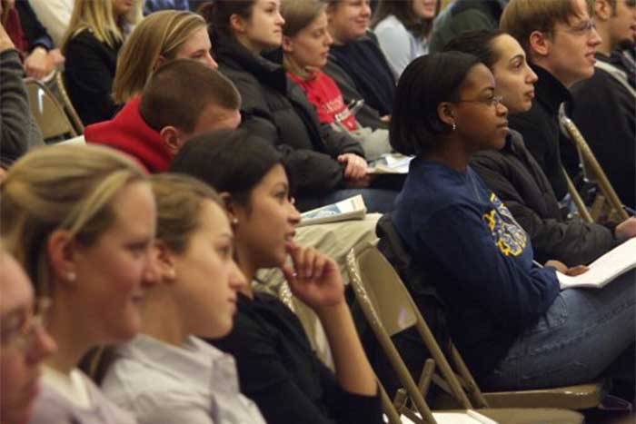 Students listen intently during a PAS presentation 