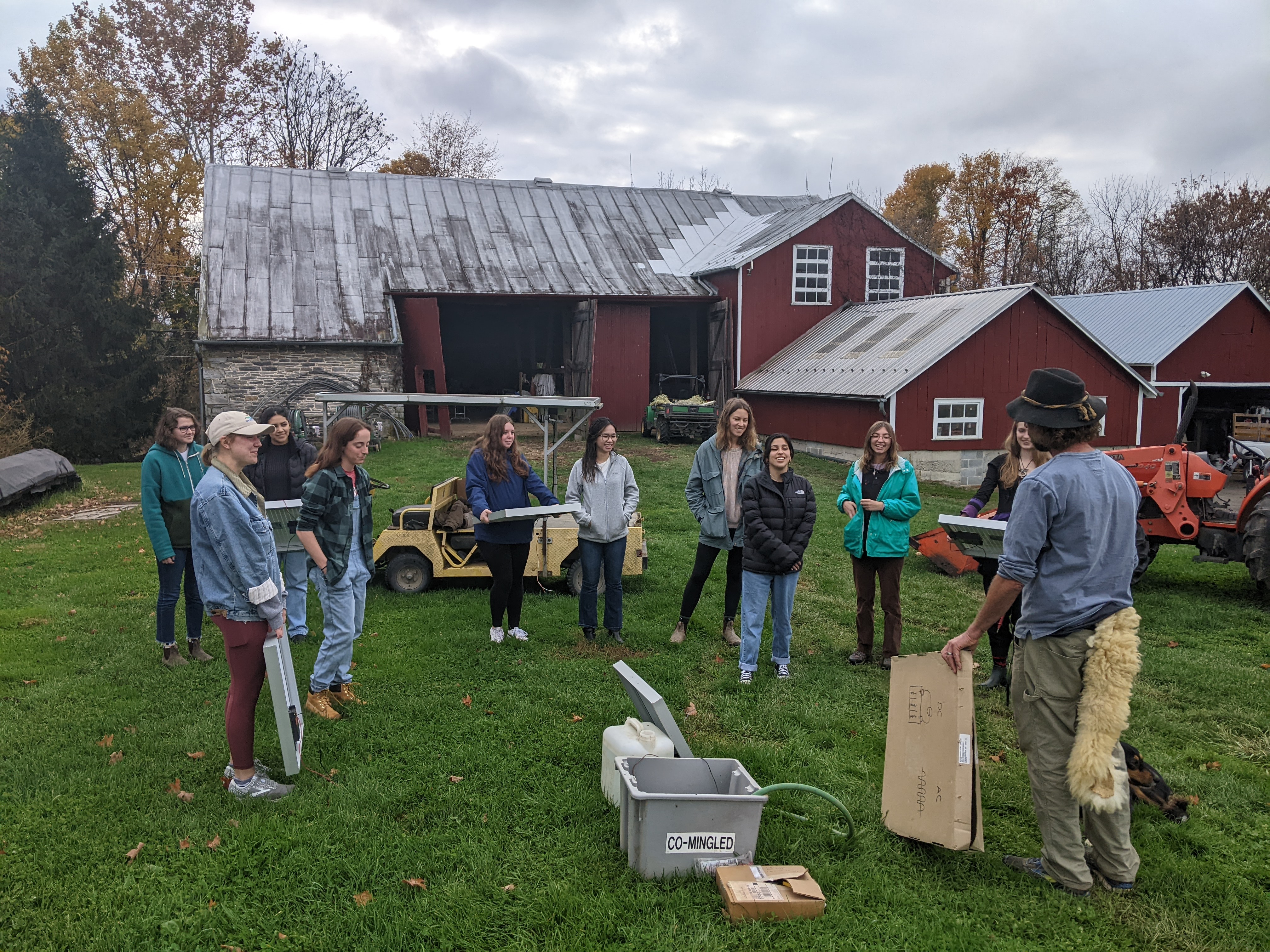 Matt is discussing college farm operations to an Environmental Health Class 