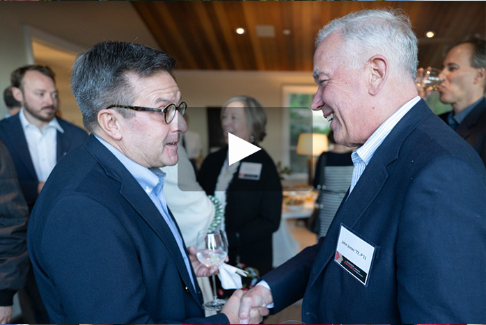 Michael Pappas and John Jones shake hands