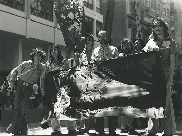 Members of the Pennsylvania Rural Gay Caucus with their hand-made banner at the Philadelphia gay pride parade circa 1976. Photo by Bari Lee Weaver.