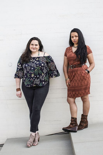 Photo of Ronee Penoi and Annalisa Dias standing on a staircase.