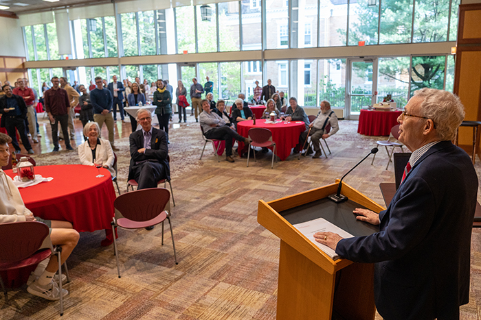 Past and present college leaders, faculty, staff and alumni attended the May 4 event in Weissman's honor. Photo by Dan Loh.