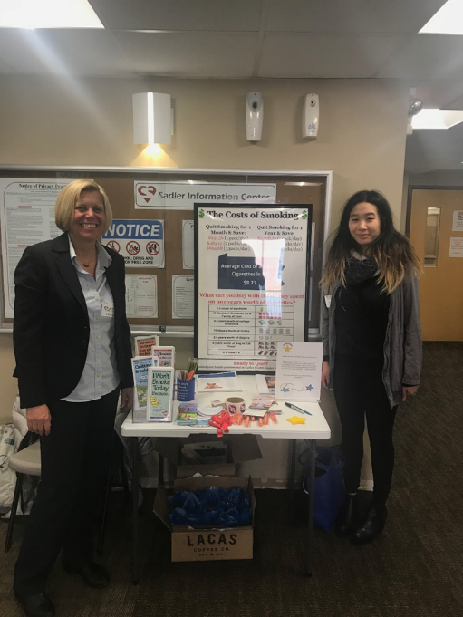 Professor Marie Helweg-Larsen and student researcher Lia Sorgen volunteering at Sadler Health Center during the Great American Smokeout