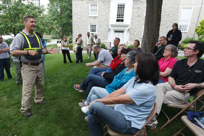 Mike Guido talks to volunteers