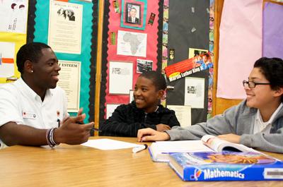 Picture of Reco Sanders working with at-risk youth