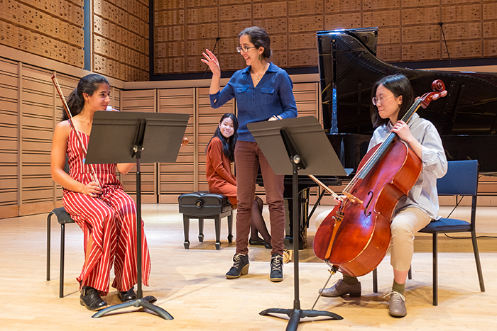 Ana María Otamendi of the Reveron Piano Trio works with Dickinson student-musicians Elisa Varlotta ‘20 (violin), Yiran Ying ’20 (cello) and Ruby Ngo ‘22 (piano).