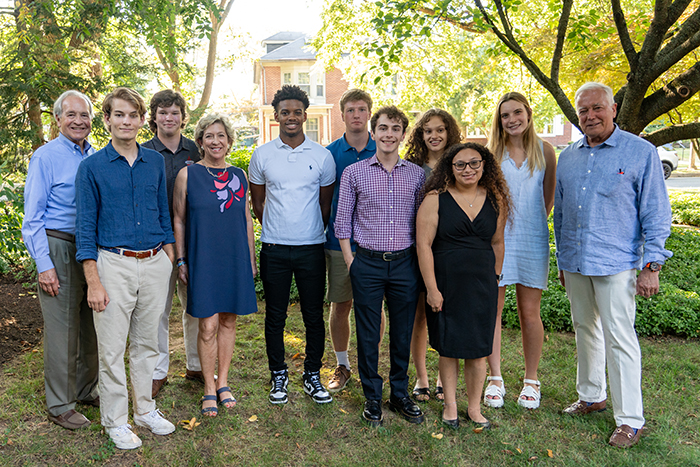 President John E. Jones  III '77, P'11 (far right) and George and Jennifer Reynolds '77 pose with recipients of the cohort-based Reynolds Leadership Scholarship. Photo by Dan Loh.