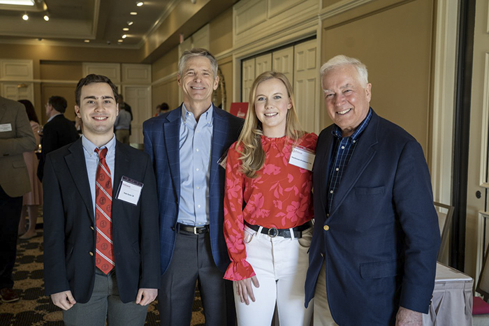 Peter Guma ’24 , Vince ’80 and Mimi Sheehy, Mackenzie Brielmann '23 and President John E. Jones III ’77, P’11, spoke about the power of scholarships during the event.