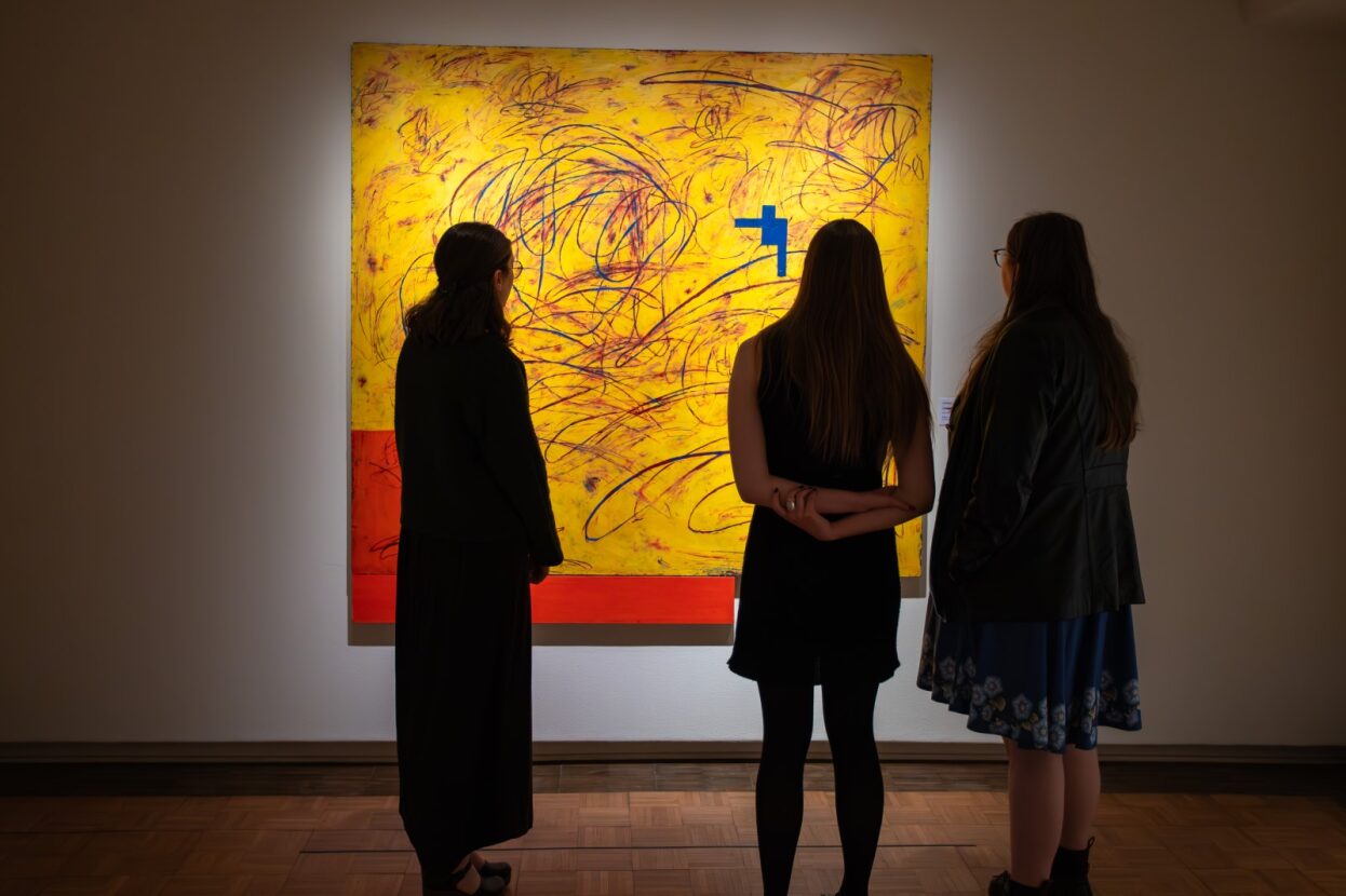 Students examine a work by Louisa Chase inside The Trout Gallery. Photo by Riley Heffron '26.