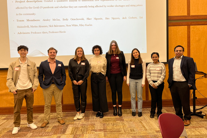 Students pose with Professor Shamma Alam